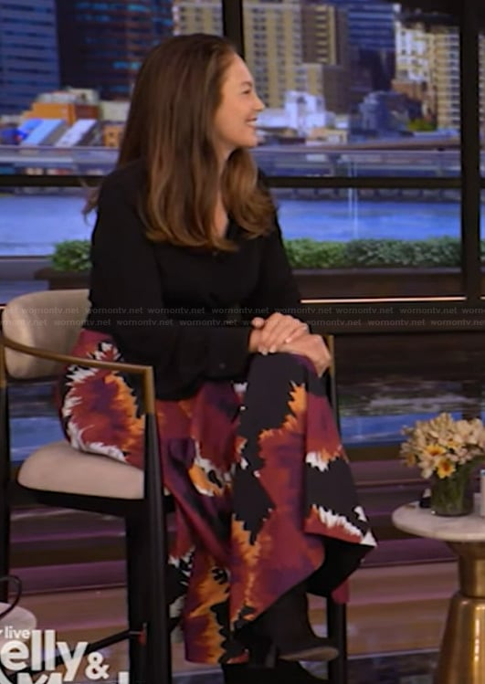 Diane Lane’s black wrap top and printed skirt on Live with Kelly and Mark