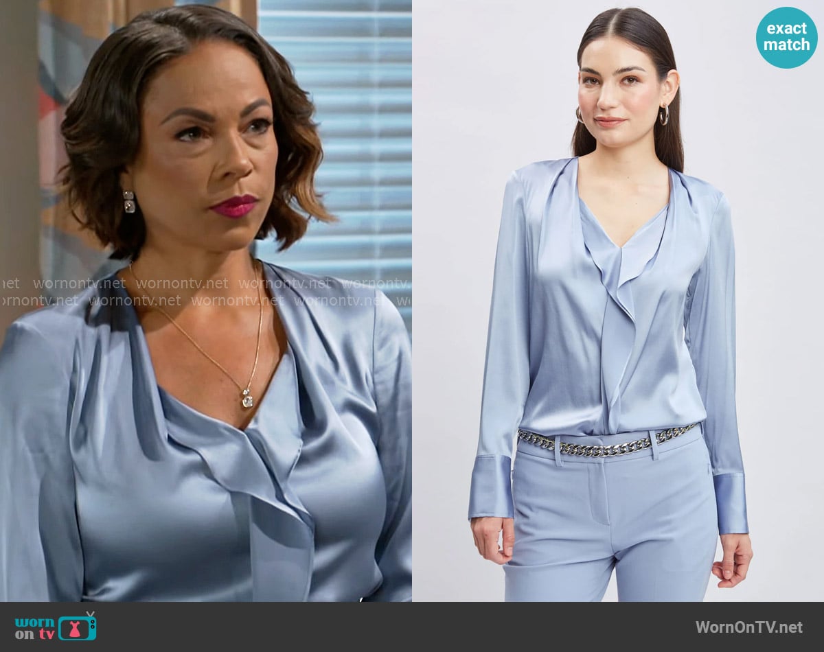 Elie Tahari Silk Satin Contour Ruffle Shirt in Blue Haze worn by Nicole Dupree Richardson (Daphnee Duplaix) on Beyond the Gates