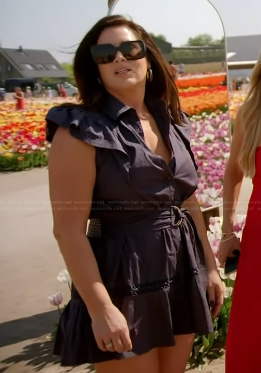 Emily’s navy belted ruffle dress on The Real Housewives of Orange County