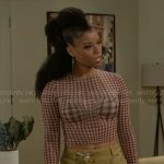 Eva’s plaid top and wide leg jeans on Beyond the Gates