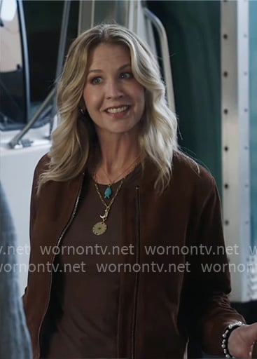 Eve’s brown suede bomber jacket on Shifting Gears