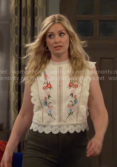 Gemma’s cream floral embroidered top on The Neighborhood