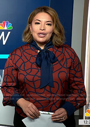 Gilma Avalos’s red printed tie neck blouse on NBC News Daily