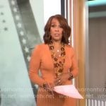 Gayle King’s orange rib knit pleated dress on CBS Mornings