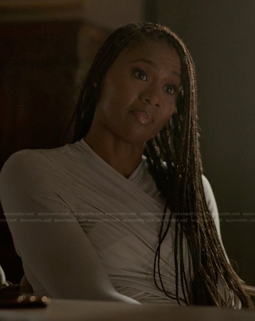 Jax’s gray long sleeve wrap top on Reasonable Doubt