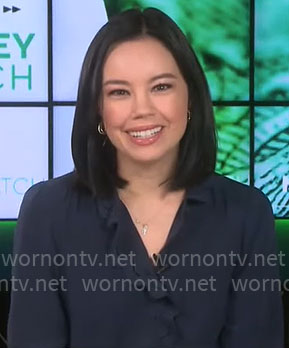 Jo Ling Kent’s navy scalloped trim top on CBS Mornings
