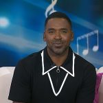 Justin’s black contrast trim zip polo on Today