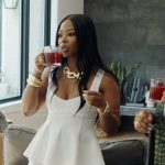Keiarna’s white peplum top on The Real Housewives of Potomac