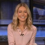Kelly’s pink polo sweater on Live with Kelly and Mark