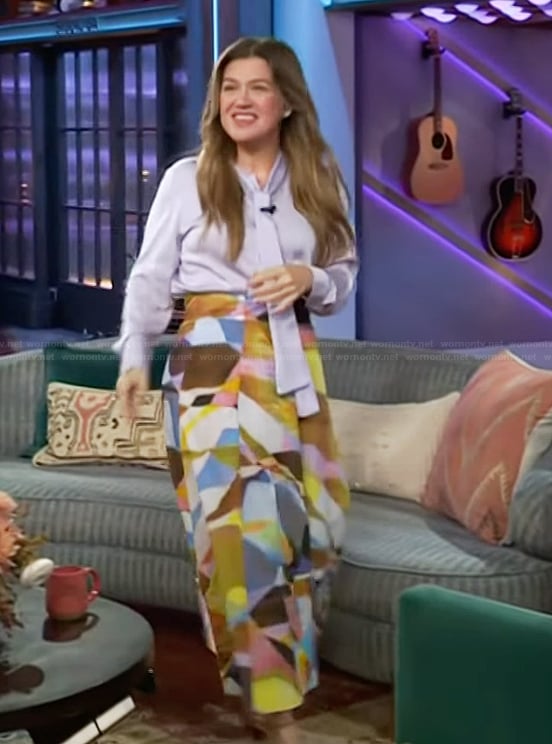 Kelly’s lavender tie neck blouse and printed skirt on The Kelly Clarkson Show