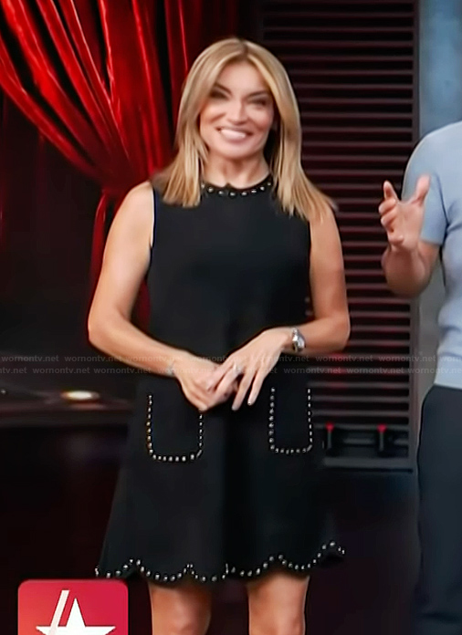 Kit’s black studded trim mini dress on Access Hollywood