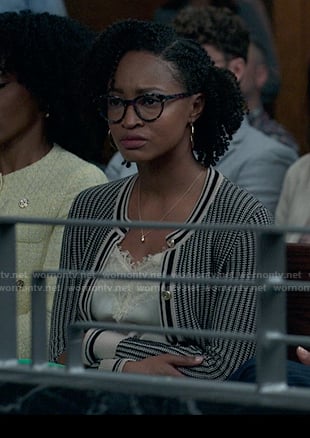 Kristin’s black and beige stripe cardigan on Reasonable Doubt
