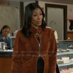 Leslie’s orange velvet coat on Beyond the Gates