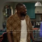 Malcolm’s brown embroidered shirt on The Neighborhood