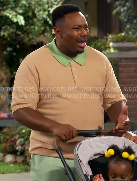 Marty’s camel polo shirt with green collar on The Neighborhood
