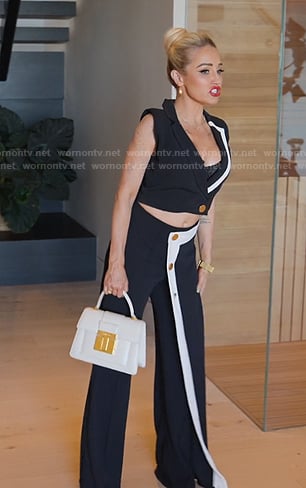 Mary’s black contrast trim crop top and pants on Selling Sunset