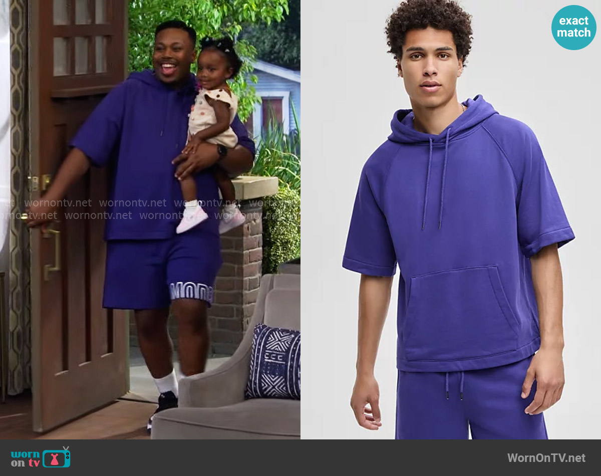 Mode of One Short-Sleeve Hoodie in Violet Glow worn by Marty (Marcel Spears) on The Neighborhood
