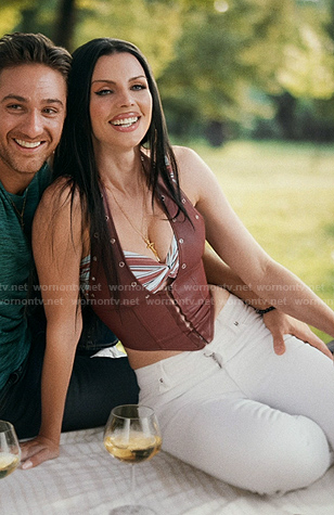 Raquel’s brown grommet leather vest on Elsbeth