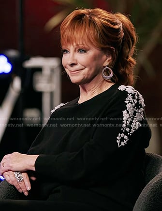 Reba’s black floral embroidered sweater on The Voice