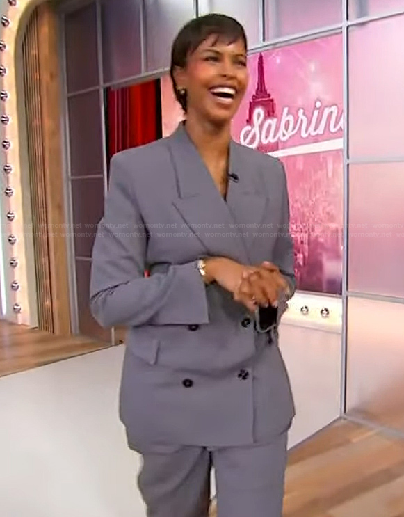 Sabrina’s gray double breasted blazer and pants on Sherri