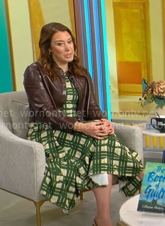 Sarah Gelman’s green plaid dress and brown leather shirt on CBS Mornings