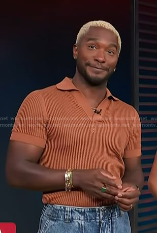 Scott’s brick orange mesh polo on Access Hollywood