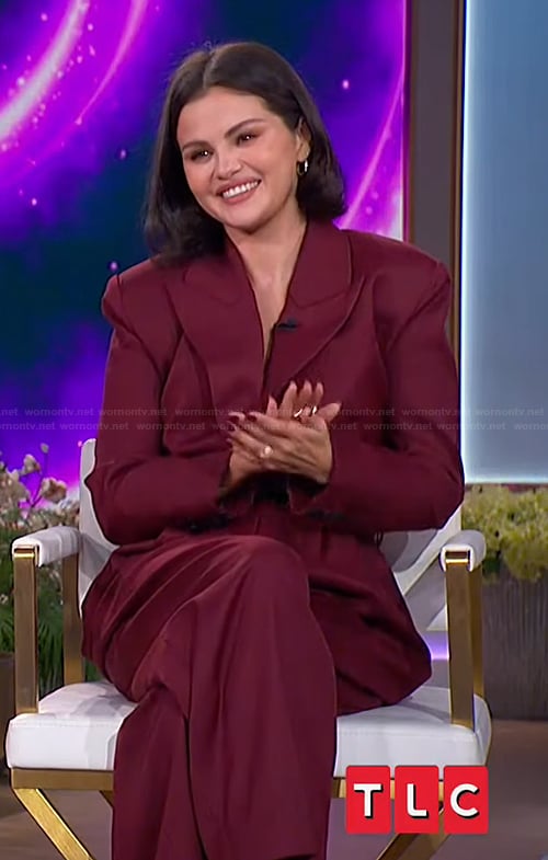 Selena Gomez’s burgundy blazer jumpsuit on The Jennifer Hudson Show