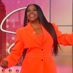 Sherri’s orange blazer and pants on Sherri