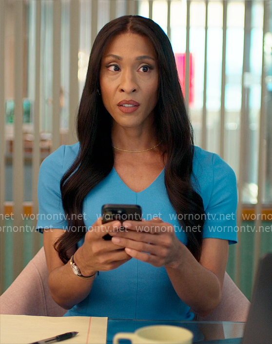 Sofia’s turquoise blue v-neck sheath dress on Loot