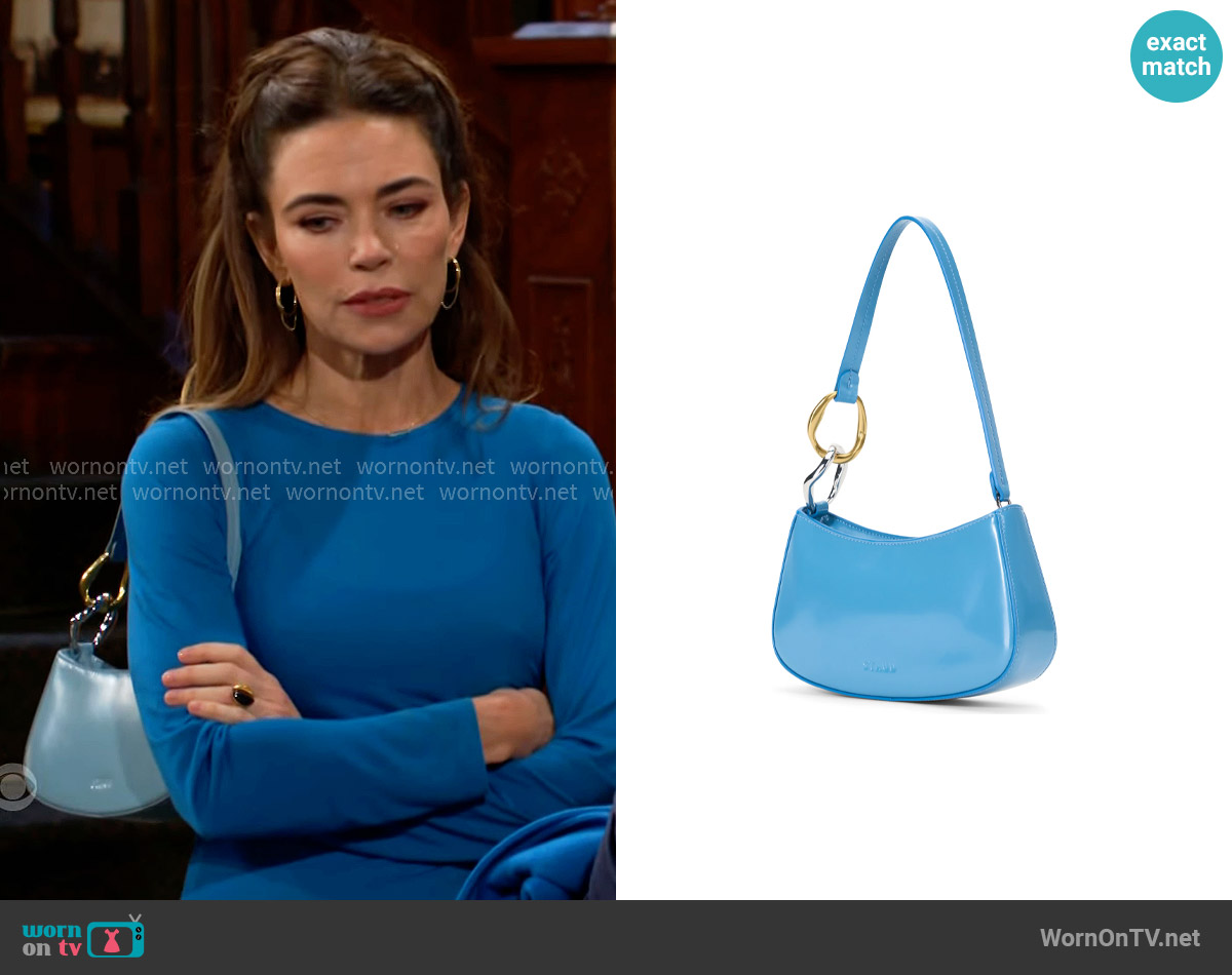 Staud Ollie Bag in Staud Blue worn by Victoria Newman (Amelia Heinle) on The Young and the Restless