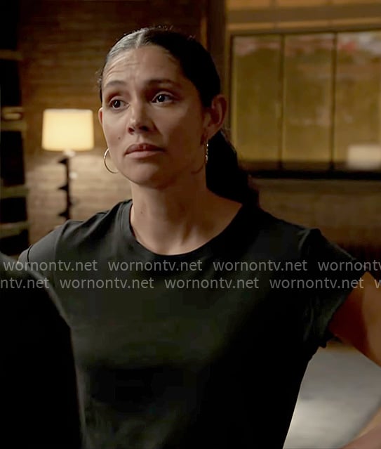 Stella’s black muscle tee on Chicago Fire