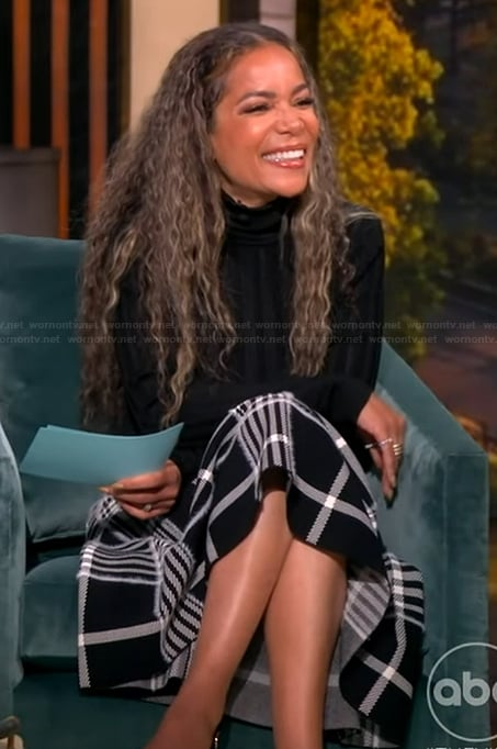 Sunny’s black turtleneck sweater and plaid skirt on The View
