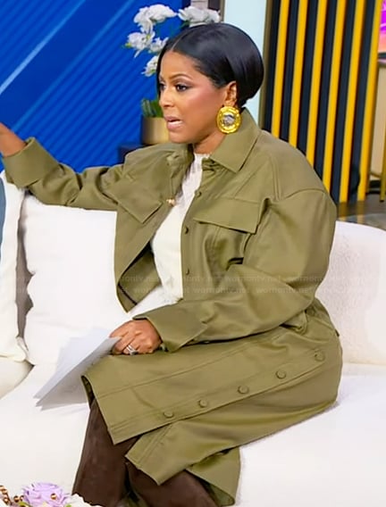 Tamron’s green cropped shirt and shorts on Tamron Hall Show