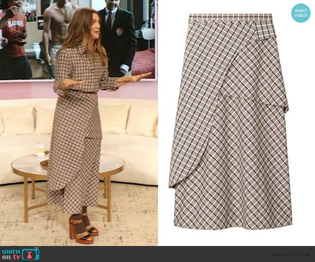 Tory Burch Windowpane wrap skirt worn by Drew Barrymore on The Drew Barrymore Show