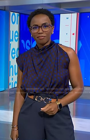 Zinhle’s brown polka dot asymmetric top on NBC News Daily