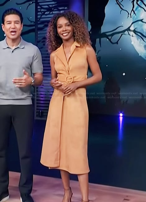 Zuri’s beige suede wrap dress on Access Hollywood