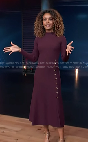Zuri’s burgundy button detail dress on Access Hollywood