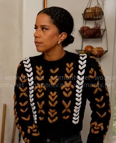 Ariana Diaz’s navy chunky knit sweater on CBS Mornings