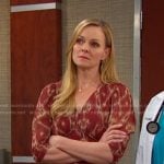 Belle’s red ikat print v-neck dress on Days of our Lives