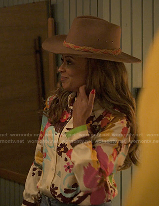 Brandy’s floral button down blouse on Reasonable Doubt