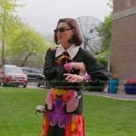 Bronwyn’s black floral tie neck blouse and skirt on The Real Housewives of Salt Lake City