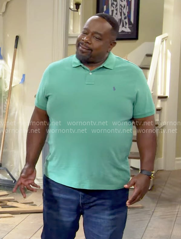 Calvin’s green polo shirt on The Neighborhood