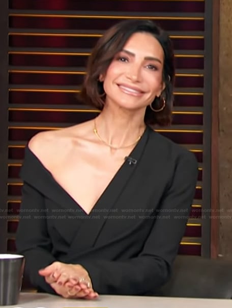 Courtney Lopez’s black one shoulder dress on Access Hollywood