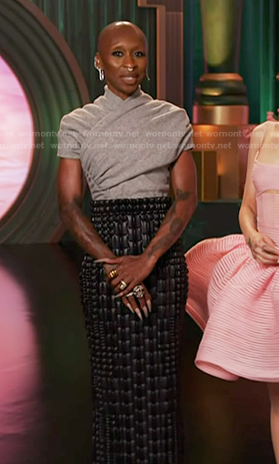 Cynthia Erivo’s grey gathered cross sweater and skirt on The Voice