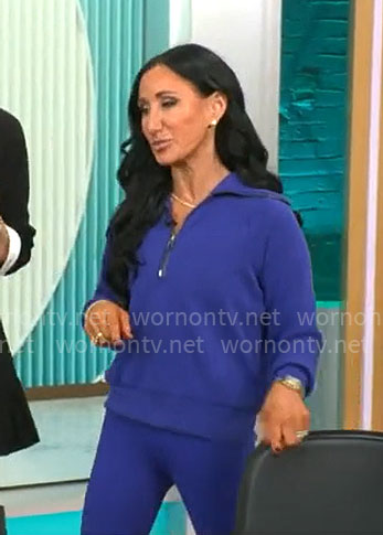Elizabeth Werner’s blue leggings and sweatshirt on CBS Mornings