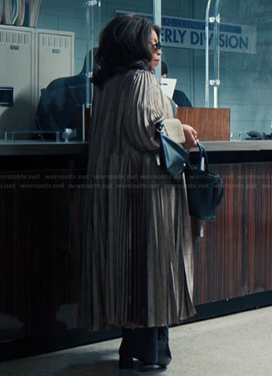 Emerald’s brown check print coat on Alls Fair