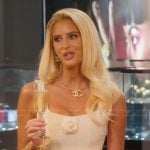 Emma’s white floral applique bustier dress on Selling Sunset