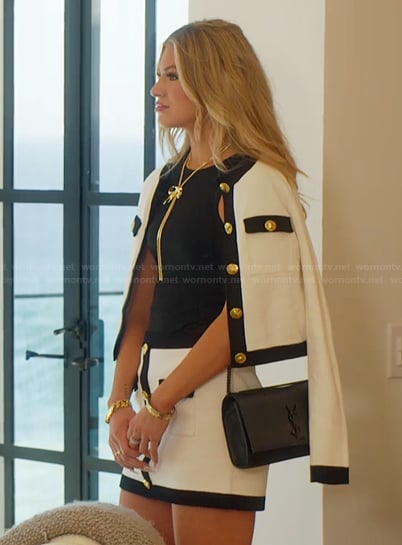 Fiona’s white contrasting cardigan on Selling the OC