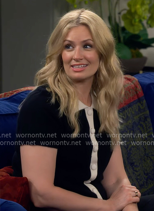 Gemma’s black and white short-sleeve cardigan on The Neighborhood