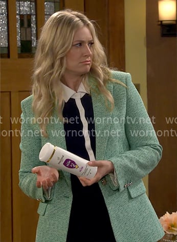 Gemma’s green blazer and contrast trim polo top on The Neighborhood